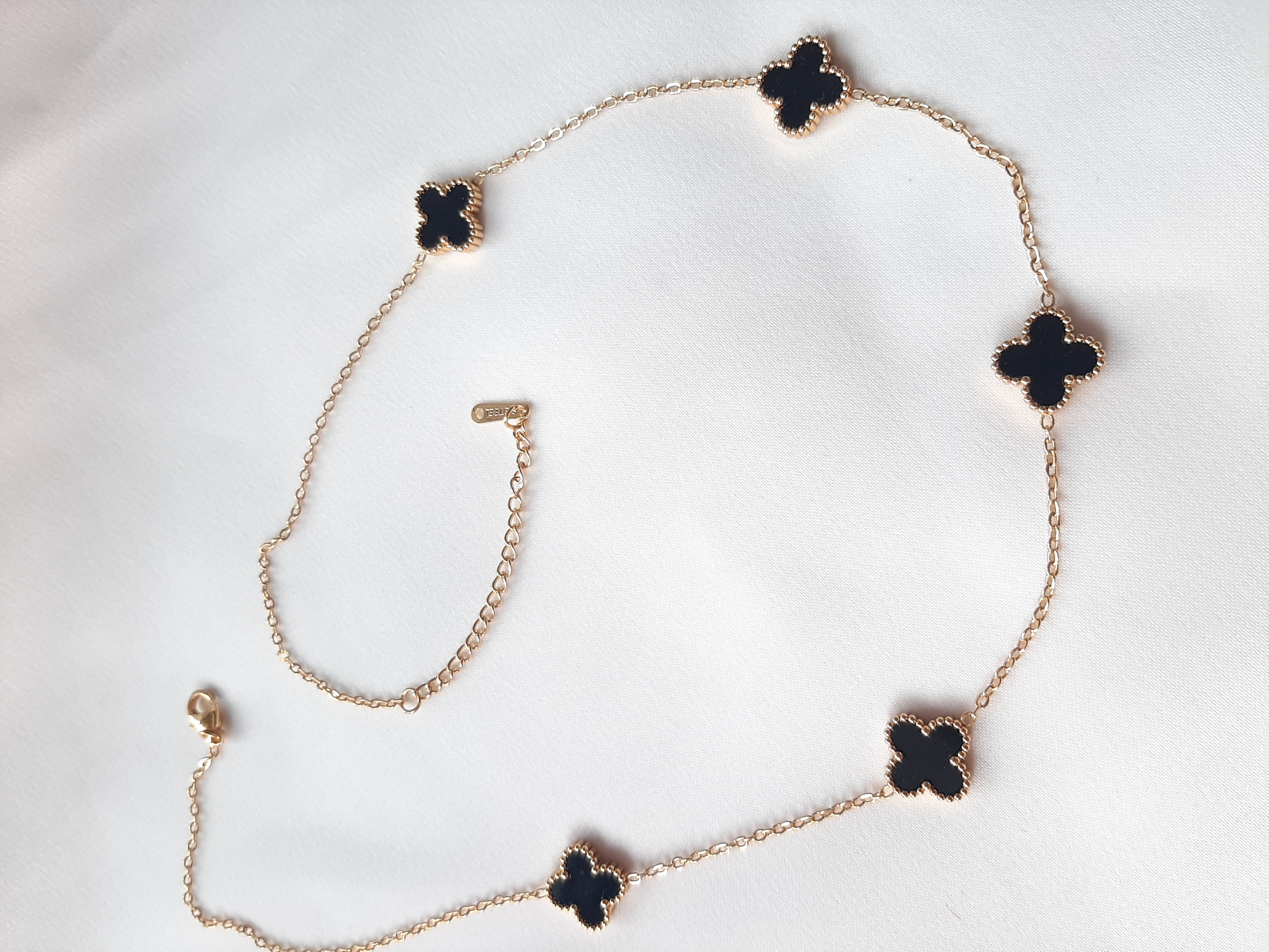 شامل ۵گل ونکلیف مشکی -طلایی